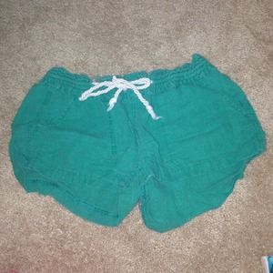 Roxy, turquoise shorts.