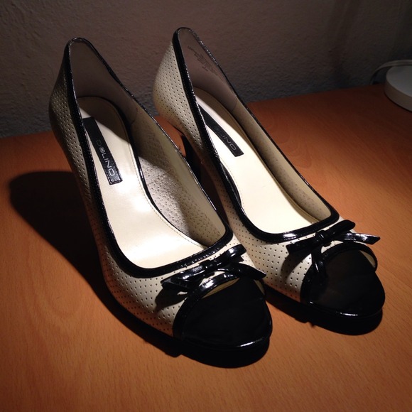 Women's white and black leather heels