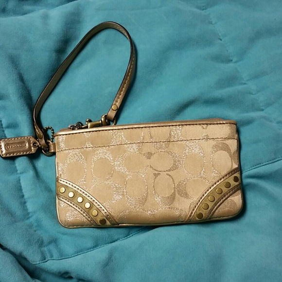 Gold coach wristlet