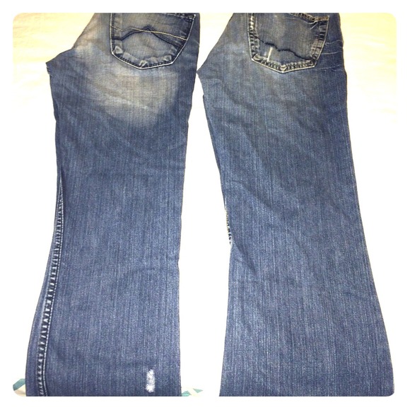 Three pair Armani Exchange and BKE jeans