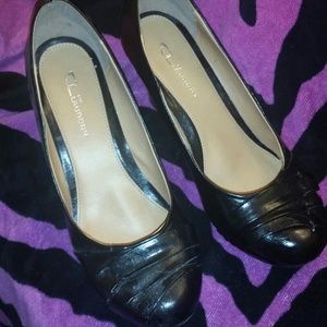 Black wedges with pleated toe accent from DSW