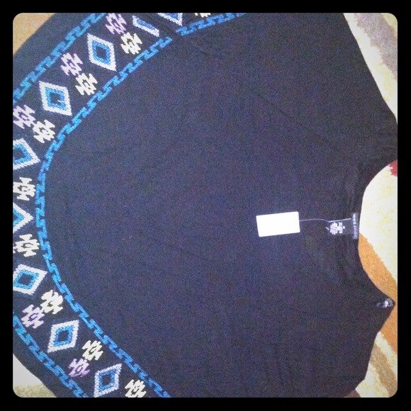 Embroidered hem poncho