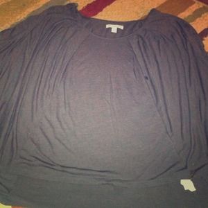 Open shoulder grey top.