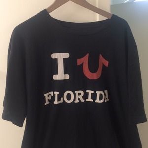 White red and black true religion shirt.