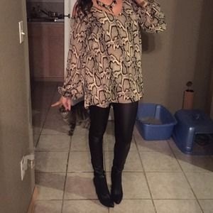 Show me your Mumu peekaboo shoulder tunic top.