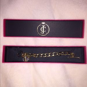 Juicy couture gold charm bracelet.