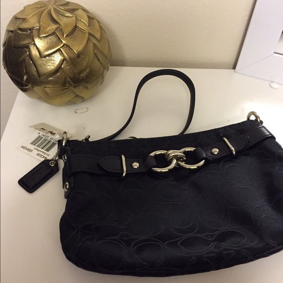 Coach black wristlet. ✋ no trades