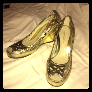 Gold peep toe wedges