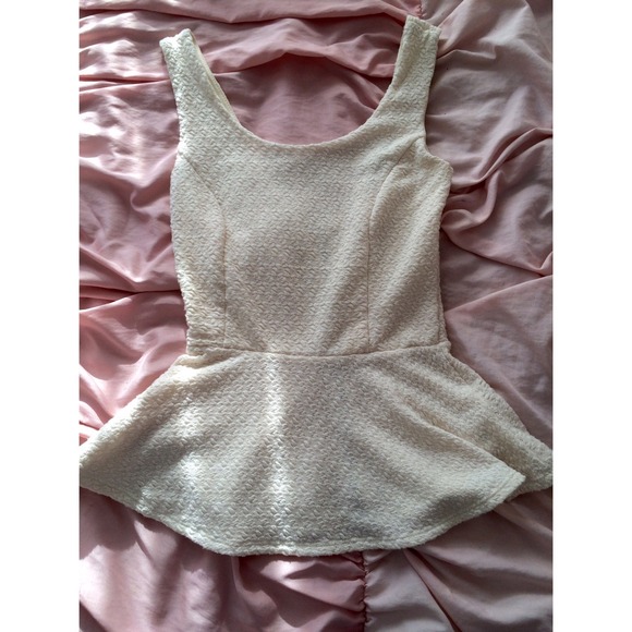 Ivory peplum top
