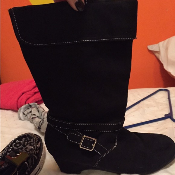 Black boots with a buckle