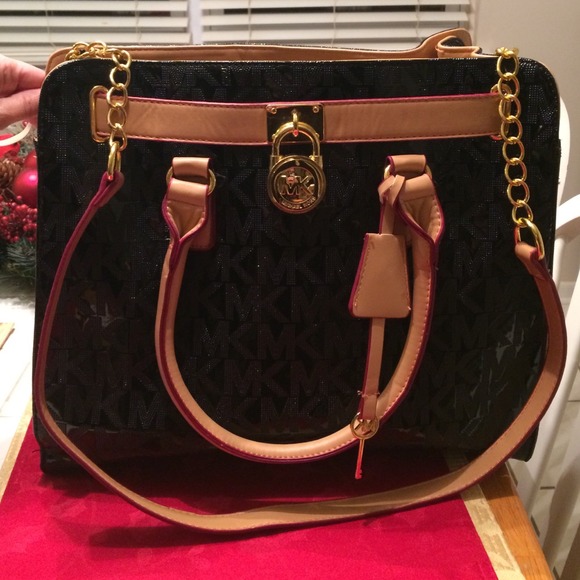 Michael Kors Handbags - BRAND NEW LARGE BLACK MK PURSE