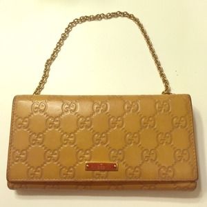 Authentic Gucci GG wallet on a chain