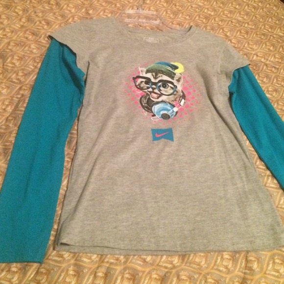 A Nike shirt that has been worn only once.