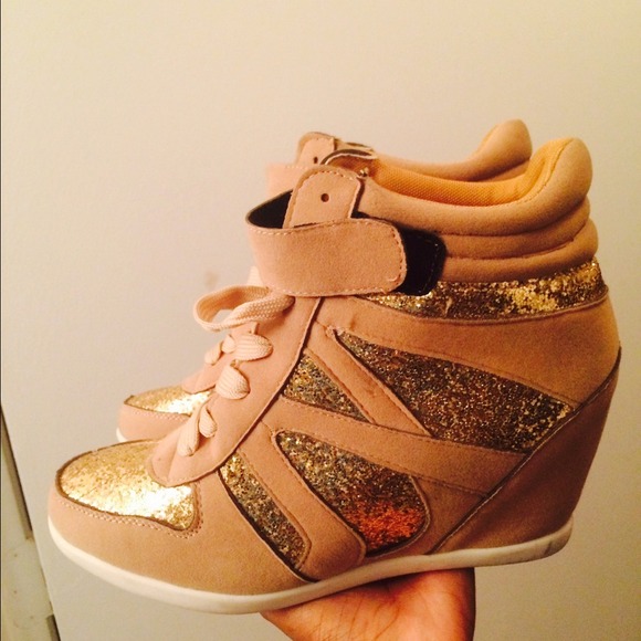 Never worn before gold sneaker wedges.