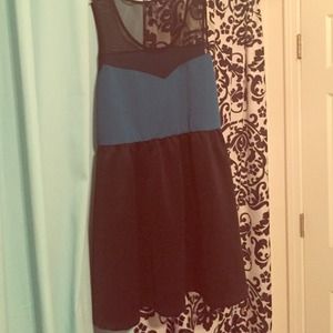 A little black dress with a dash of blue