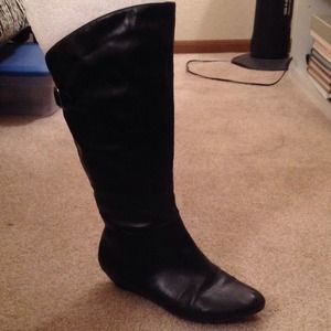 Black tall boots with small wedge