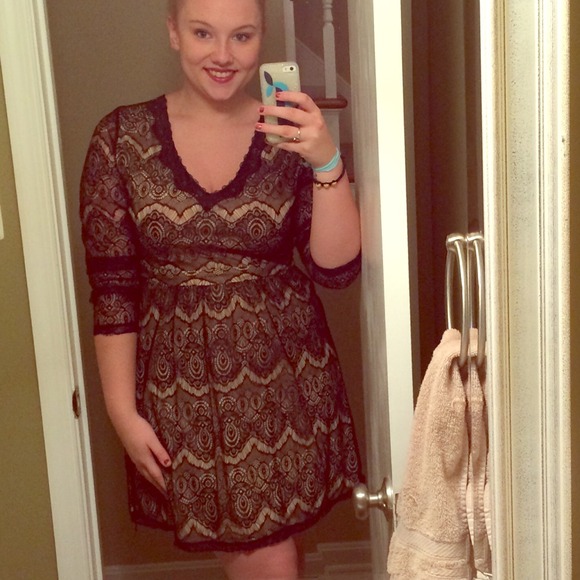 Lacy black dress with nude underlay