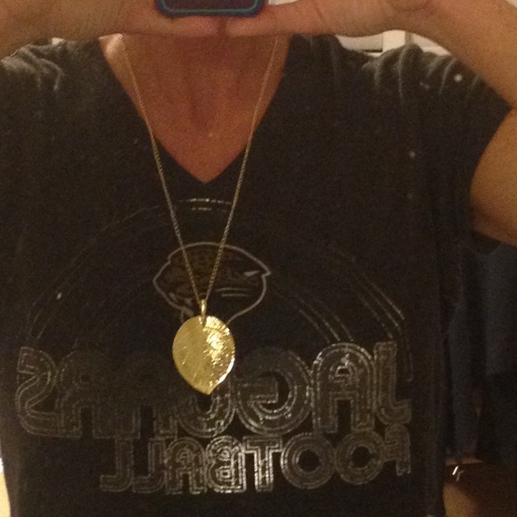 Gold colored solid leaf necklace