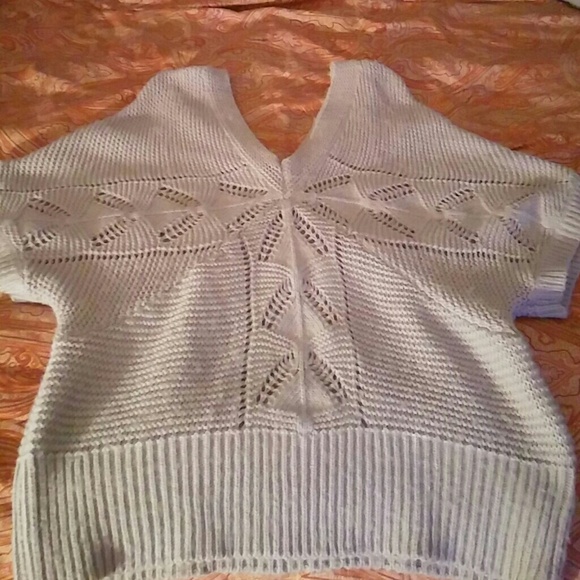 Sexy sweater hangs off your shoulders