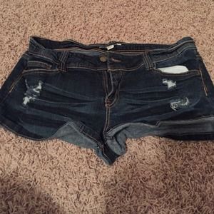 Destroyed denim shorts