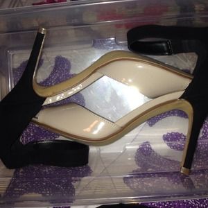 Nude and black open toed heels