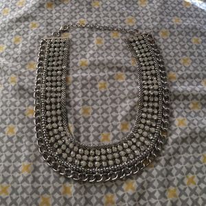 Silver statement necklace.