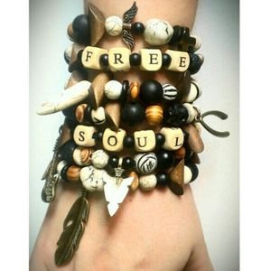 Stack of bracelets designed and hand made by me