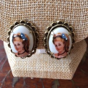 Vintage girls face on ceramic clip-on earrings
