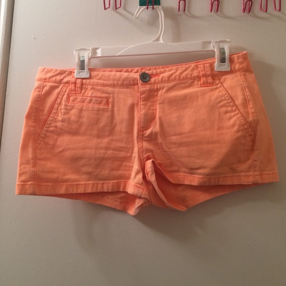 Bright orange short shorts