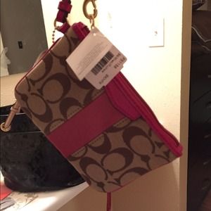 Brand spanking new Coach wristlet! Tags still on.
