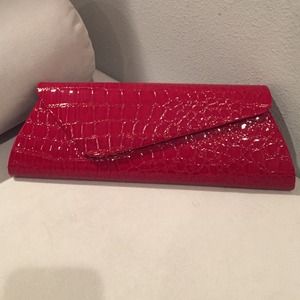 New red patent clutch