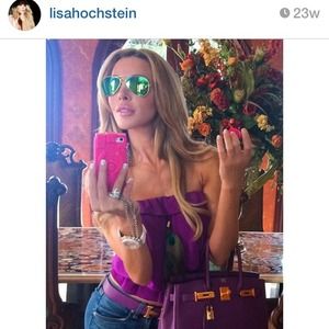 Magenta romper with peacock feather