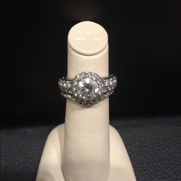 Diamond engagement ring with a diamond band.