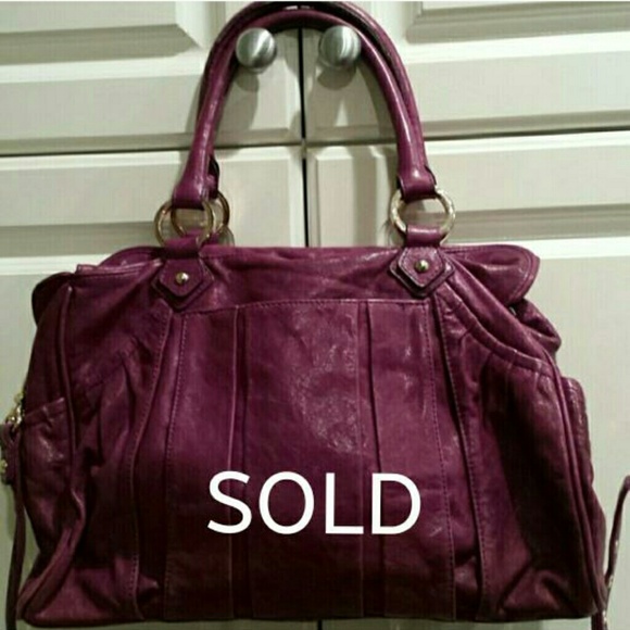 Authentic Junior Drake eggplant colored handbag