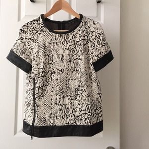 Knit snakeskin with faux quilted leather trim top