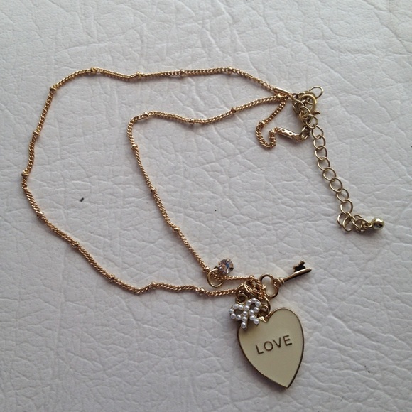 Gold charm necklace