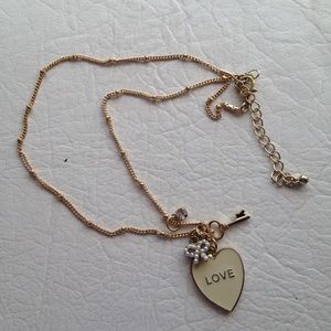 Gold charm necklace