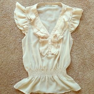 Tan frilly top!