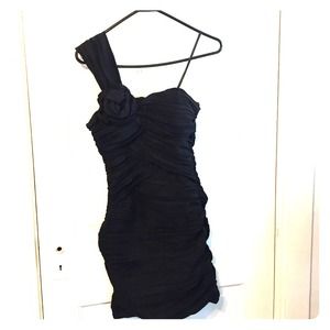 Stunning tight fitting little black dress! Size 6!