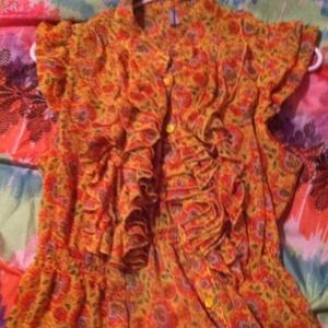 Orange multicolored floral shirt