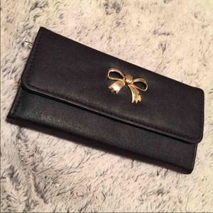 Gold ribbon, black wallet