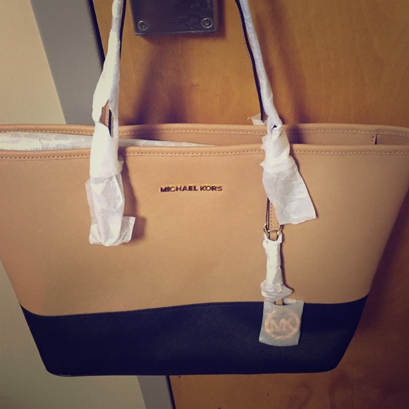 Authentic Brand new Michael Kors Jet Set Travel