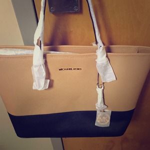 Authentic Brand new Michael Kors Jet Set Travel