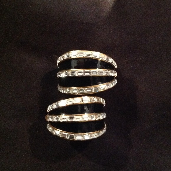 SOLD. St. John black and righnstone earrings