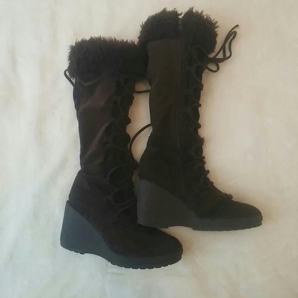 Brown fur boots.