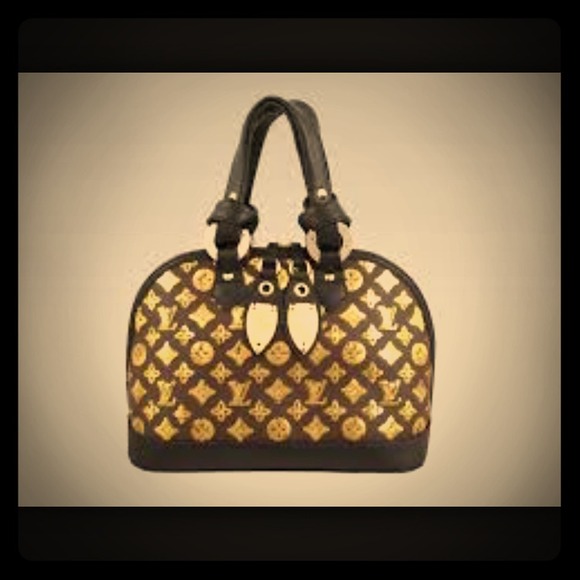 Monogram Eclipse Alma Gold handbag