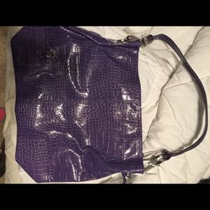 Purple leather handbag