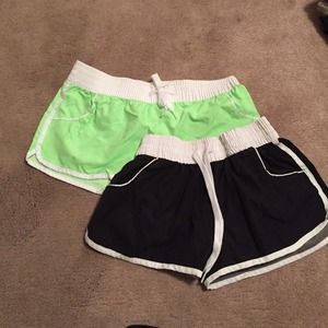 Neon green and black running shorts