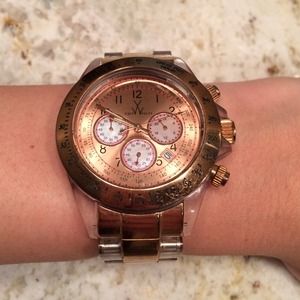 Rose gold and clear plastic chronograph toy watch