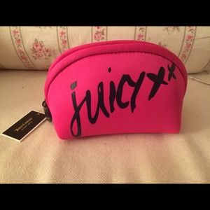 Juicy couture fuchsia small make up bag.